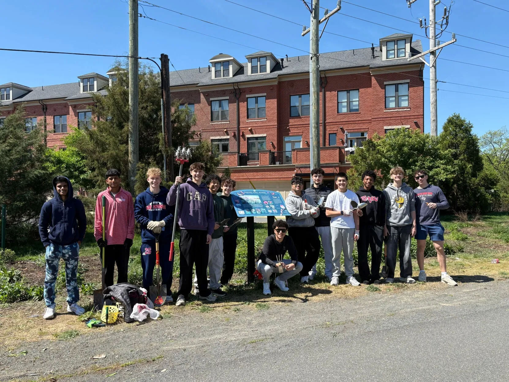 Loudoun Nature Conservation Project members clearing invasive plants at the Harrison Street Pollinator Meadow in Leesburg, Virginia.