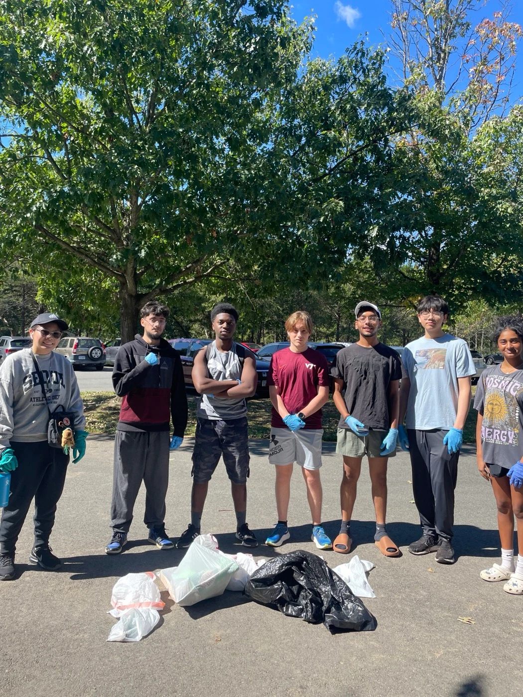 An LNCP cleanup crew posing together outdoors